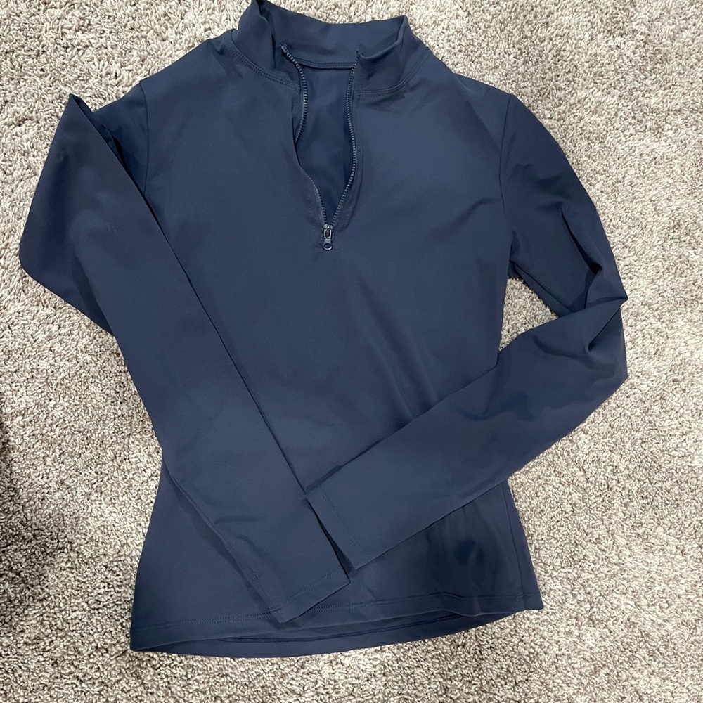 NEVER WORN brand new- size medium- a little cropped - half zip- tight fitted